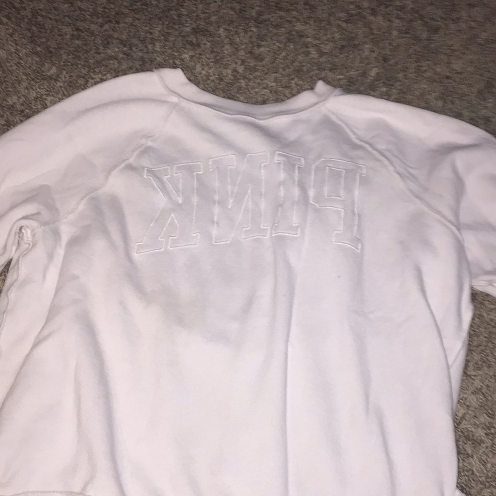 A sweater from the store PINK